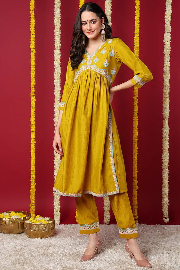 Charming Yellow Silk Blend Solid Embroidered Flared Kurta Set